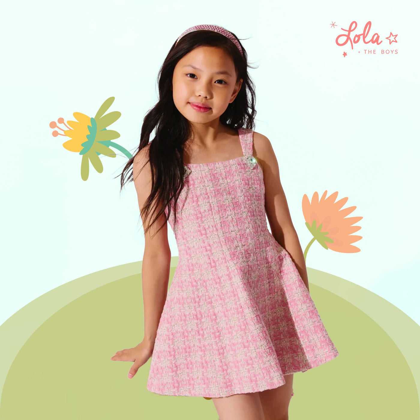 Happy child wearing eco-friendly kids’ clothing made from organic cotton and safe dyes