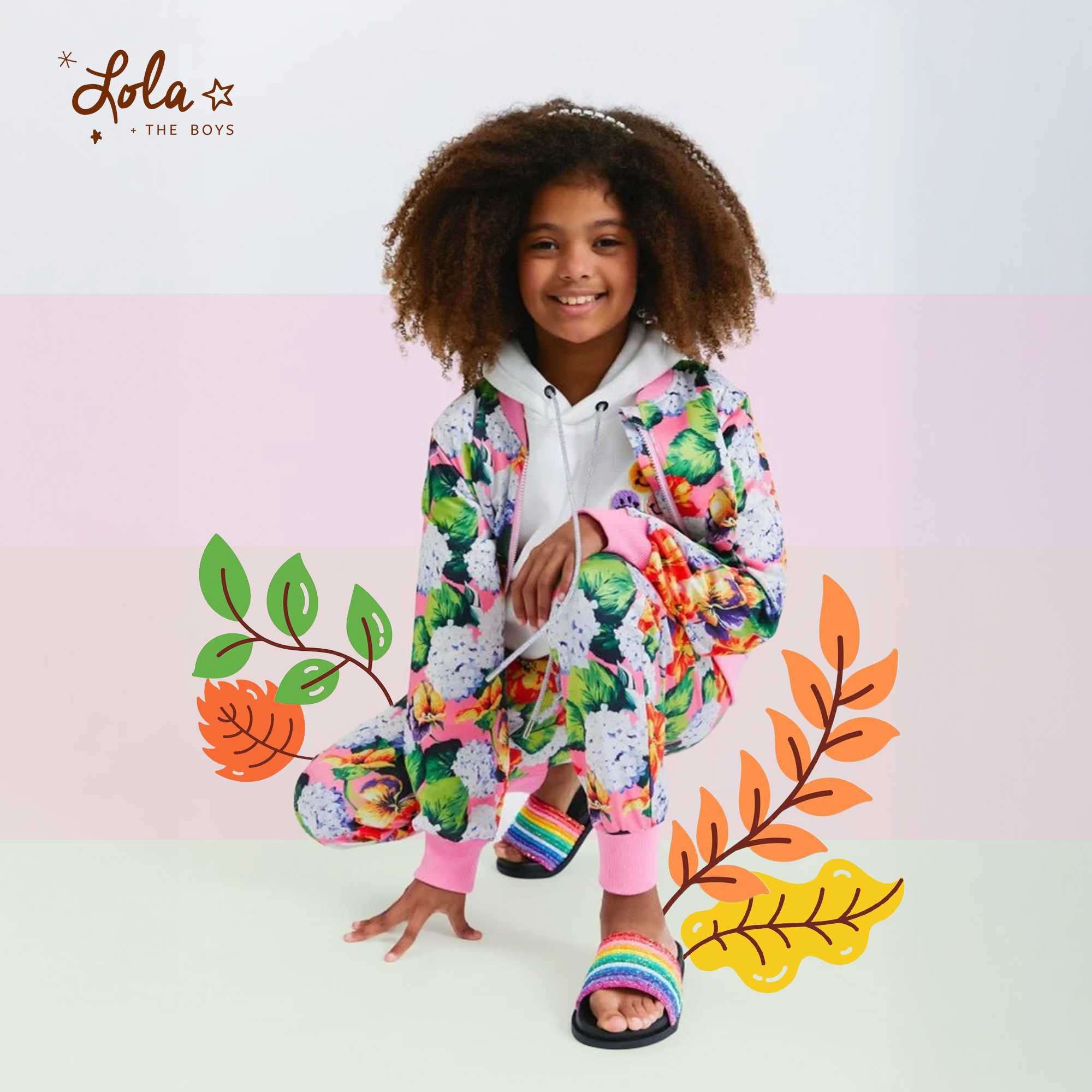 Kids wearing colorful spring floral outfits with bright seasonal patterns outdoors