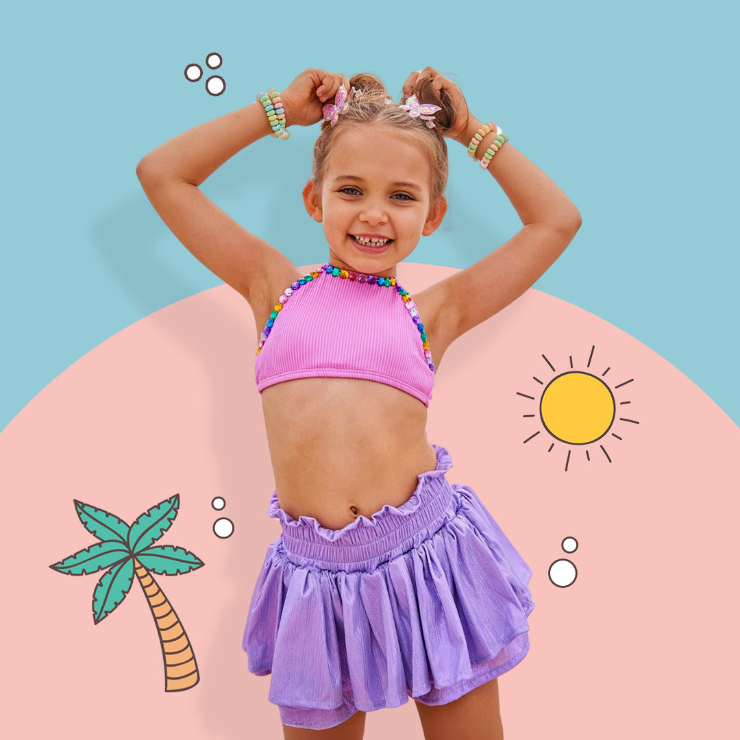 Kids’ pool party outfits from Lola and the Boys featuring colorful swimsuits, trendy summer dresses, and fun accessories for children’s pool parties
