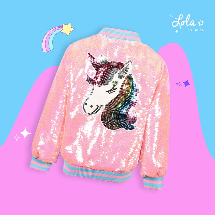 Girl wearing unicorn bomber jacket with sparkle detail