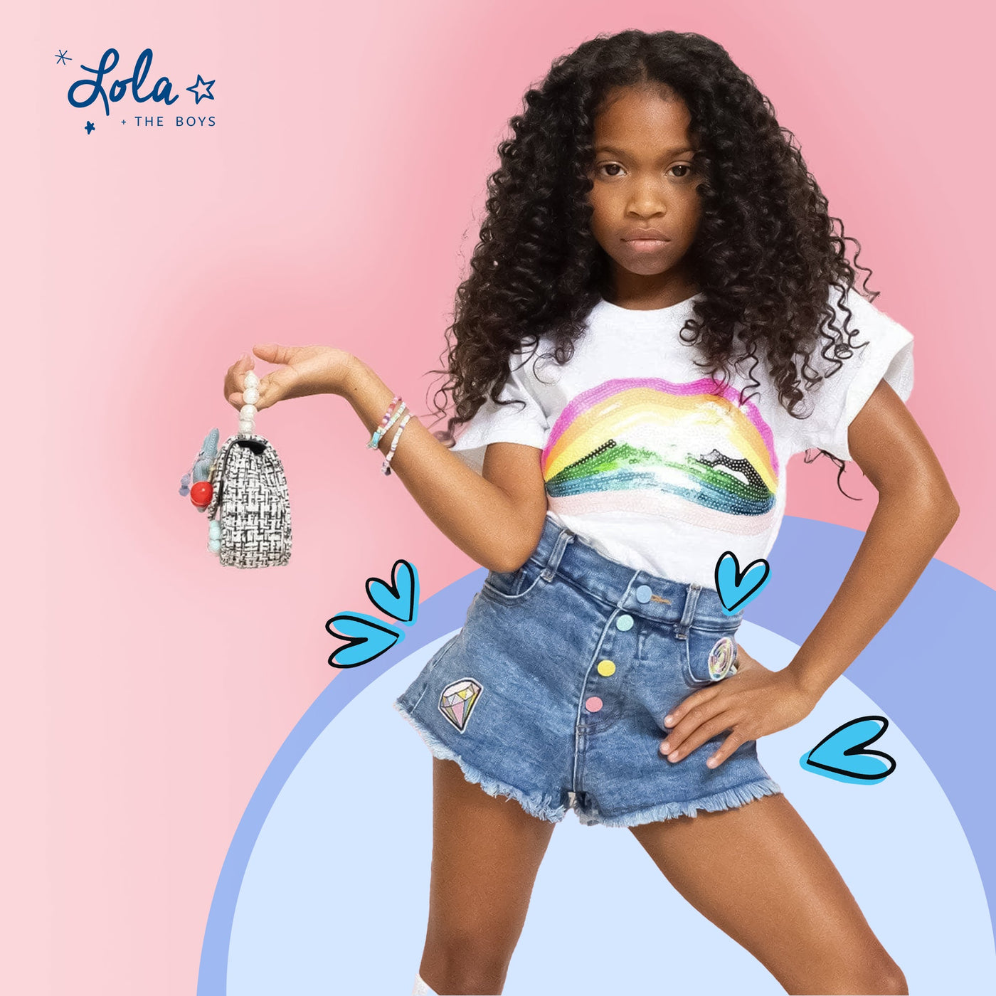  child wearing kids denim shorts styled with layers for all seasons