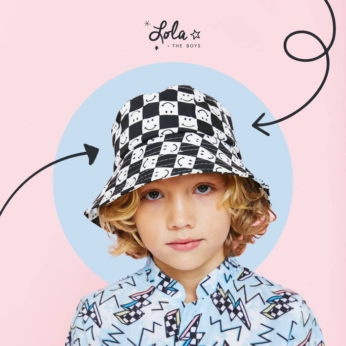 Summer hats for kids styled by Lola and the Boys with playful designs and sun protection