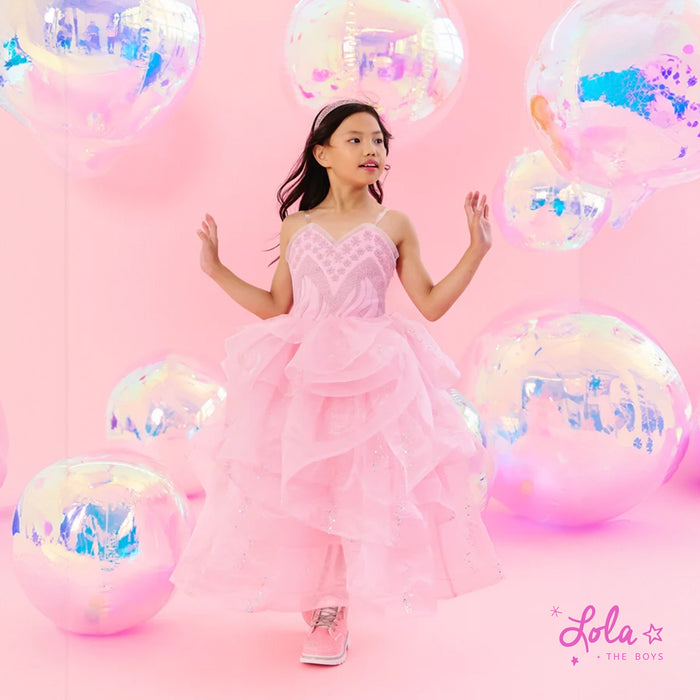 Wicked costume ideas featuring Glinda and Elphaba-inspired outfits for women and girls, perfect for fancy gatherings.