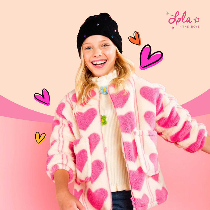 Kids wearing sparkly and colorful New Year 2026 outfits from Lola + The Boys