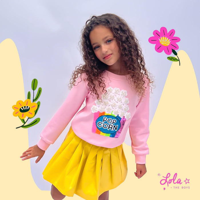 Spring dresses for girls 2026 featuring pastel ombre, rainbow tiered, and denim bow party dresses from Lola and The Boys